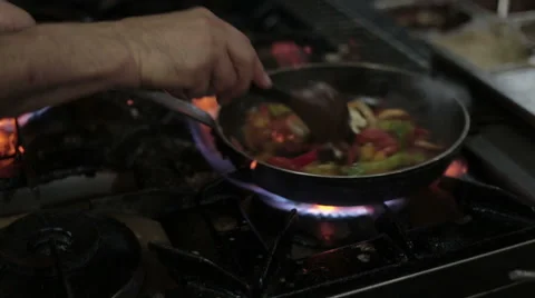 Cooking with a frying pan Stock Footage 58614649