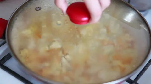 Cooking in a frying pan Stock Footage 66682163