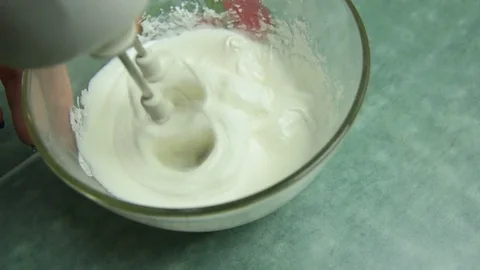 Cooking glaze or royal icing close-up Stock Footage 84968022