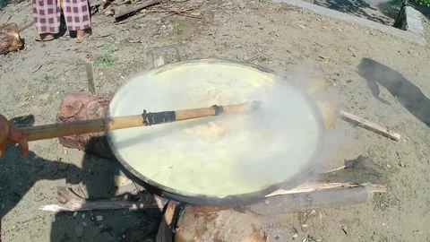 Cooking goat meat curry in an extra large pan Stock Footage 243090800