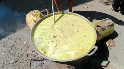 Cooking goat meat curry in an extra large pan Stock Footage 243093006