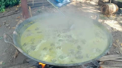 Cooking goat meat curry in an extra large pan Video stock 243093170
