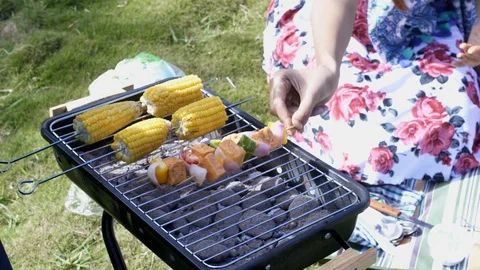 Cooking on a grill outdoors 動画素材 90835669