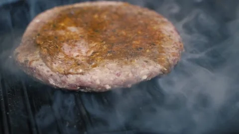 Cooking grilled burger cutlet Stock Footage 145990952