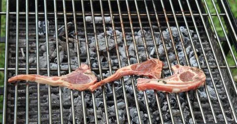 Cooking grilled chop Stock Photos