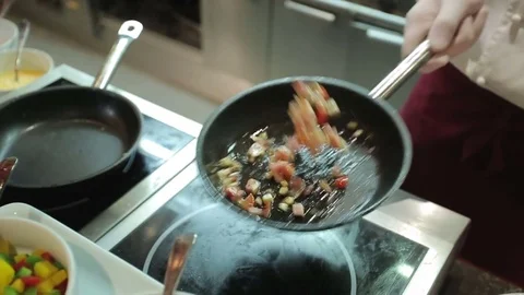 Cooking ham and eggs with vegetables top shot Stock Footage 71790029