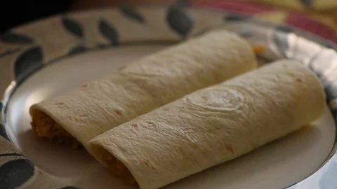 Cooking handheld burritos cheese Stock Footage 93969848