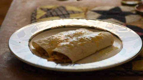 Cooking handheld burritos salsa Stock Footage 93969847