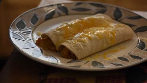 Cooking handheld burritos salsa Stock Footage 93969849