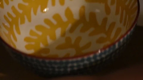 Cooking handheld cracking eggs Stock Footage 93969862