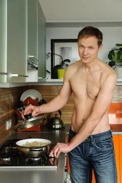Cooking at home kitchen. Stock Photos