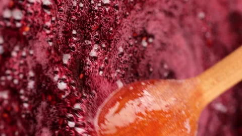 Cooking homemade raspberry jam, close up. Vertical video Stock Footage 252266545