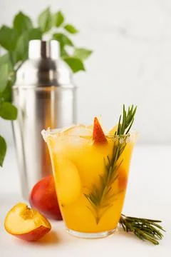 Cooking of homemade vitamin summer fresh orange peach lemonade with ice, rose Stock Photos