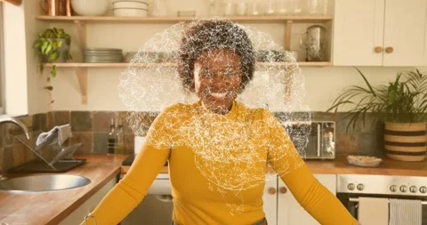 Cooking host holding pose on counter and activating swirling data globe around Stock Footage 316703502