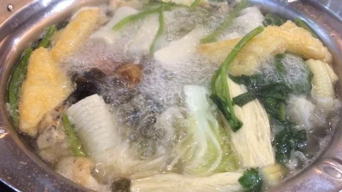 Cooking on the hotpot Stock Footage 88650573