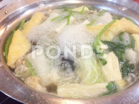 Cooking on the hotpot many ingredient such as vegetable Stock Photos