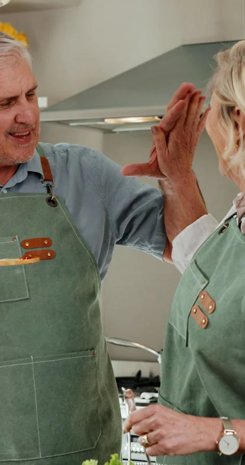 Cooking, hug or old couple in kitchen with high five, healthy diet or Stock Footage 341495533