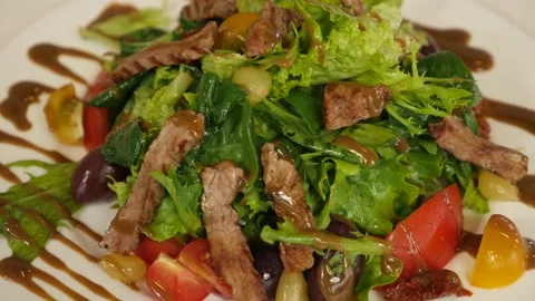 Cooking incredibly delicious vegetable stew with meat. Tasty caponata Stock Footage 239925486