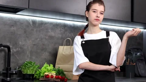 Cooking inspiration in a modern kitchen setting with fresh ingredients Vídeos de archivo 296317307