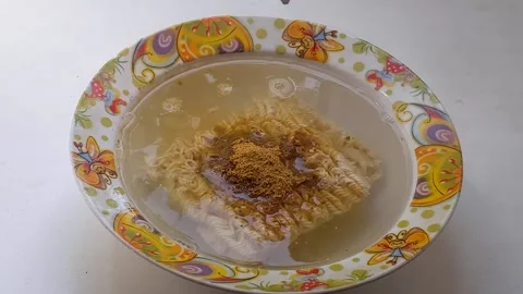 Cooking instant vermicelli. Accelerated shooting. Stock Footage 201804730