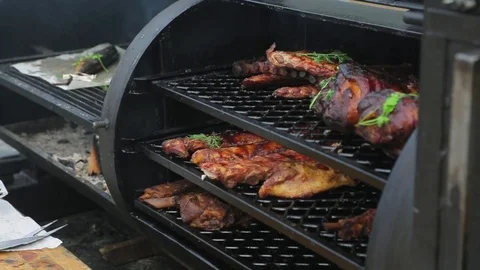 Cooking juicy meat steaks on the grill on fire Stock Footage