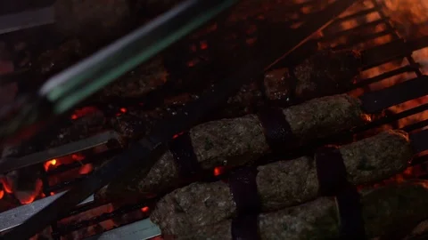 Cooking Kafta on Camp Fire Stock Footage 97040236