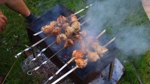 Cooking kebab on the grill Stock Footage 77571451