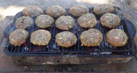 Cooking kebabs of lamb Stock Photos