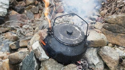 Tea Kettle on Open Fire. Tea in the Camping Stock Image - Image of