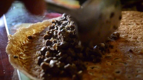 Cooking in the kitchen, rolled up pancakes Stock Footage 101665843