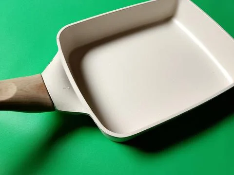 Cooking kitchen tools, Teflon box shape. Stock Photos