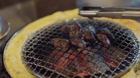 Cooking Korean BBQ on grill 動画素材 84872307