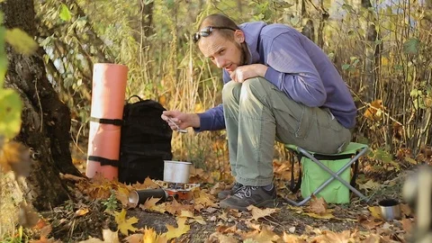 Cooking by the lake Stock Footage 99887164