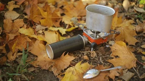 Cooking by the lake Stock Footage 103488997