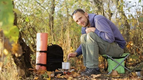 Cooking by the lake Stock Footage 106326701