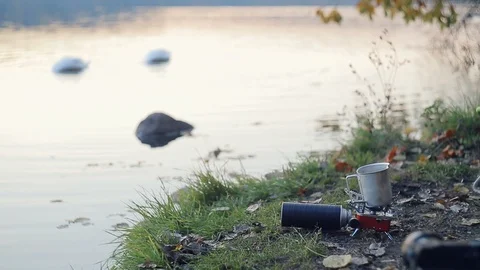 Cooking by the lake Stock Footage 106328148
