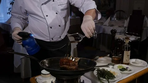 Cooking a lamb meat on fire. Chef preparing meat. Slow motion 스톡 동영상 85421347