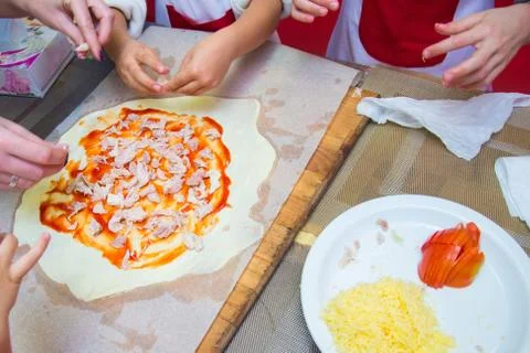 Cooking a large rectangular pizza Stock Photos