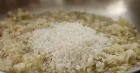 Cooking leeks and parmesan risotto video Stock Footage 80304709