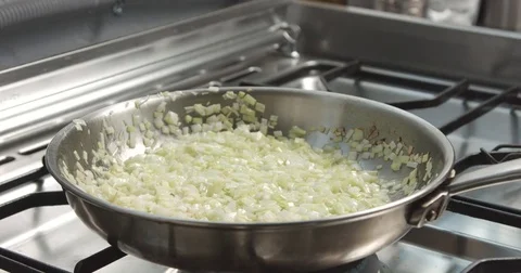 Cooking leeks and parmesan risotto video Stock Footage 80305269