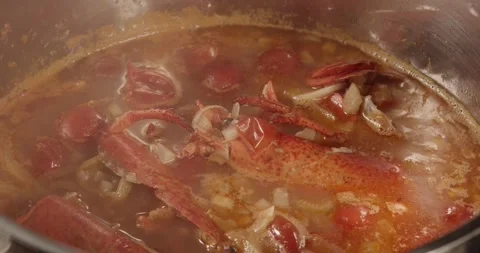 Cooking lobster shells for preparing a sauce Stock Footage 166638157