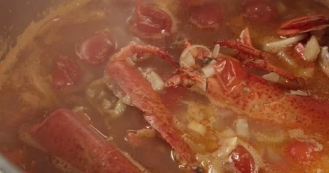 Cooking lobster shells for preparing a sauce Stock Footage 167964204