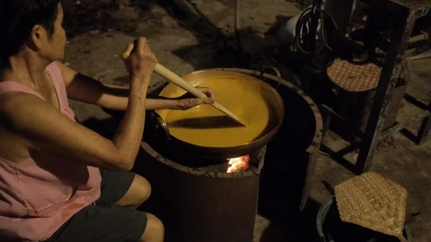 Cooking Mango Soup Paste in Old Way Stock Footage 122431694