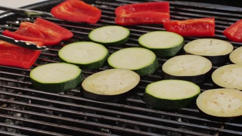 Cooking many various of vegetables on grill close-up. Making garnish for kebab Stock Footage 270019995