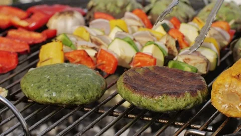 Cooking many various of vegetables on grill close-up. Making vegan, vegetarian Stock Footage 273506409