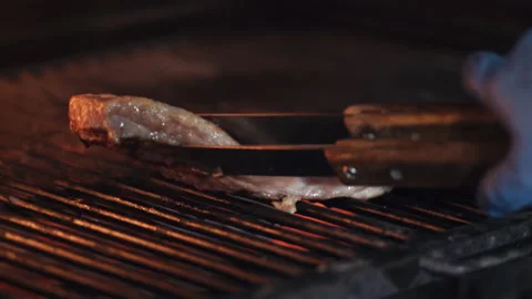 Cooking marble steak on fire. Stock Footage 169699929