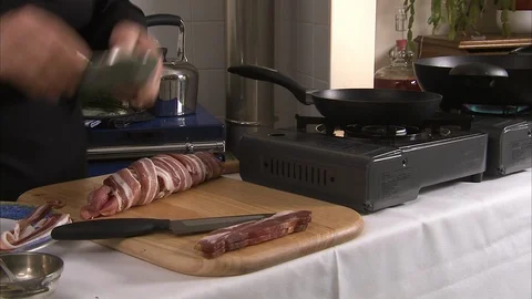 Cooking a meat in bacon wrap Stock Footage 88028435