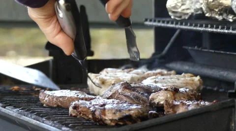 Cooking meat, barbecue, close up Stock Footage 61568346