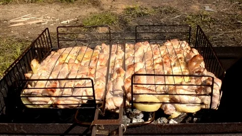 Cooking meat on a barbecue 動画素材 74865325