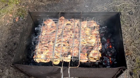 Cooking meat on a barbecue 動画素材 74865546